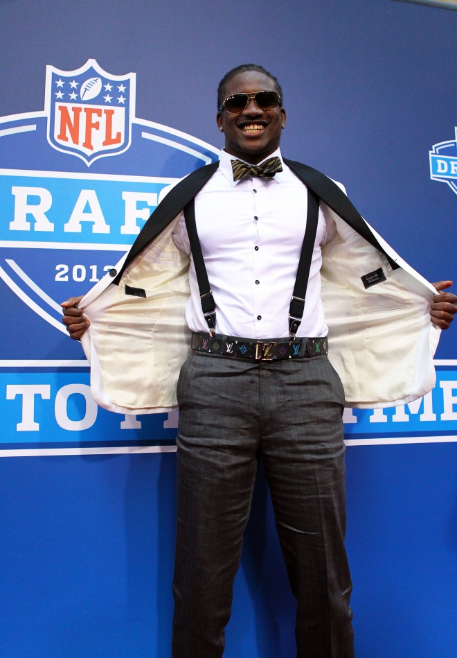 Cordarrelle Patterson shows off his suspenders during the red carpet portion of the NFL draft of Football, outside Radion City Music Hall in New York City