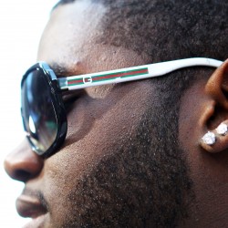 NFL defensive takcle Sharrif Floyd with sunglasses and a shiny diamond stud earring during the NFL Draft, outside Radio City Music Hall in New York City.