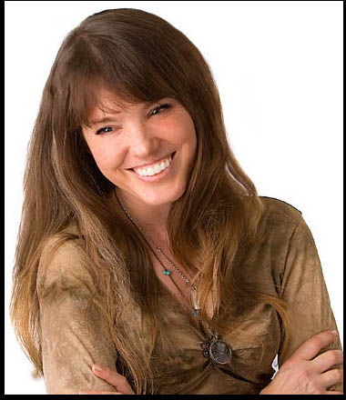 Photographer Suzy Allman in a studio portrait